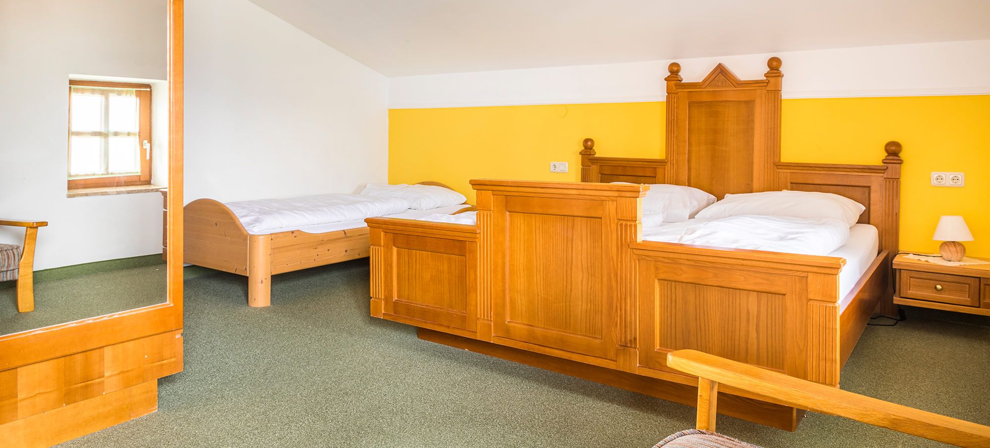 Gemütliches Schlafzimmer im Appartement Typ B am Bio-Bauernhof Unterviehhausbauer in Großarl